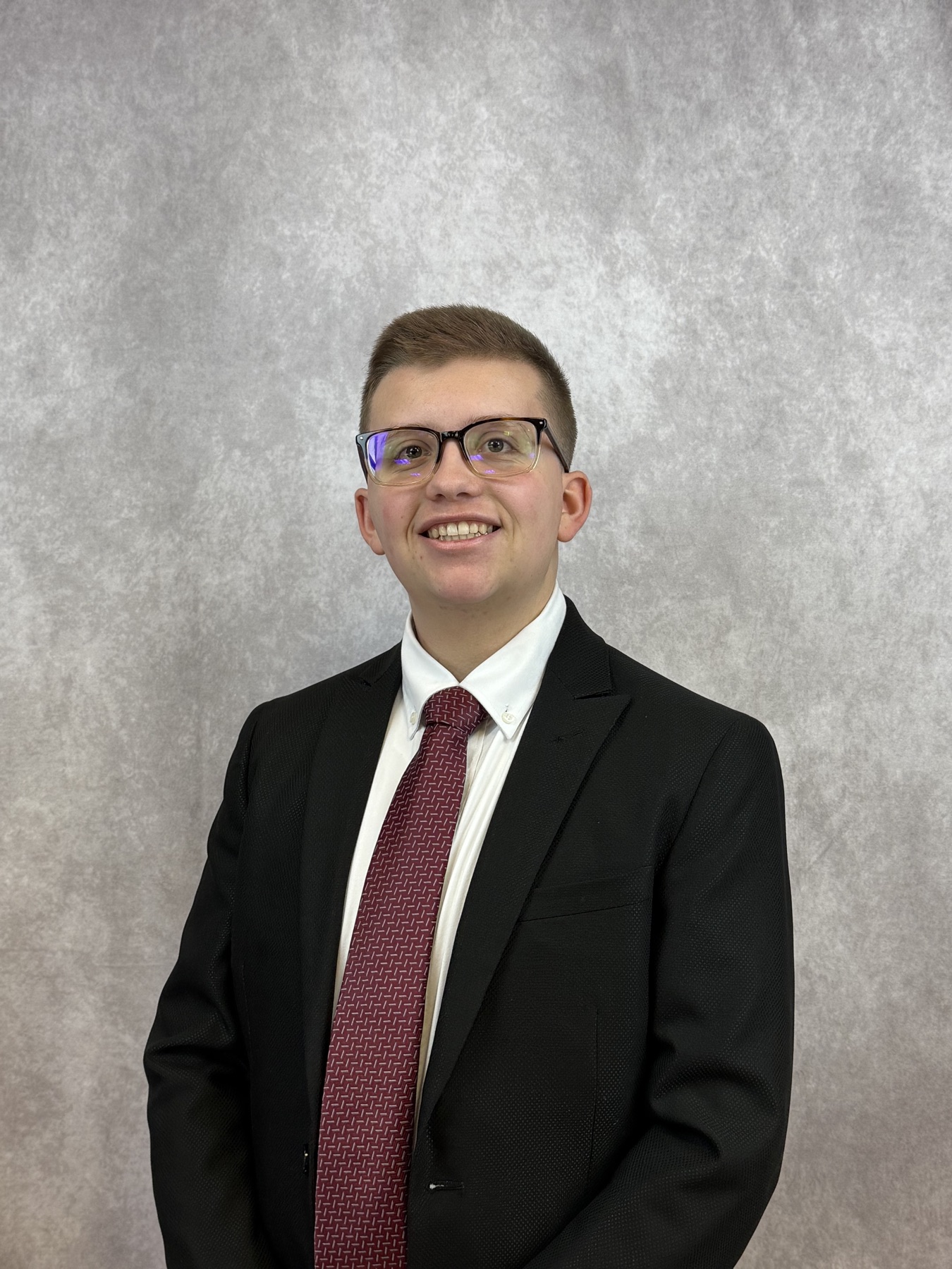 Professional portrait of Elliot Luman